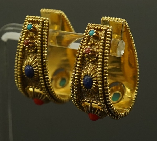 A pair of continental high carat gold and semi-precious gem set hinged loop earrings